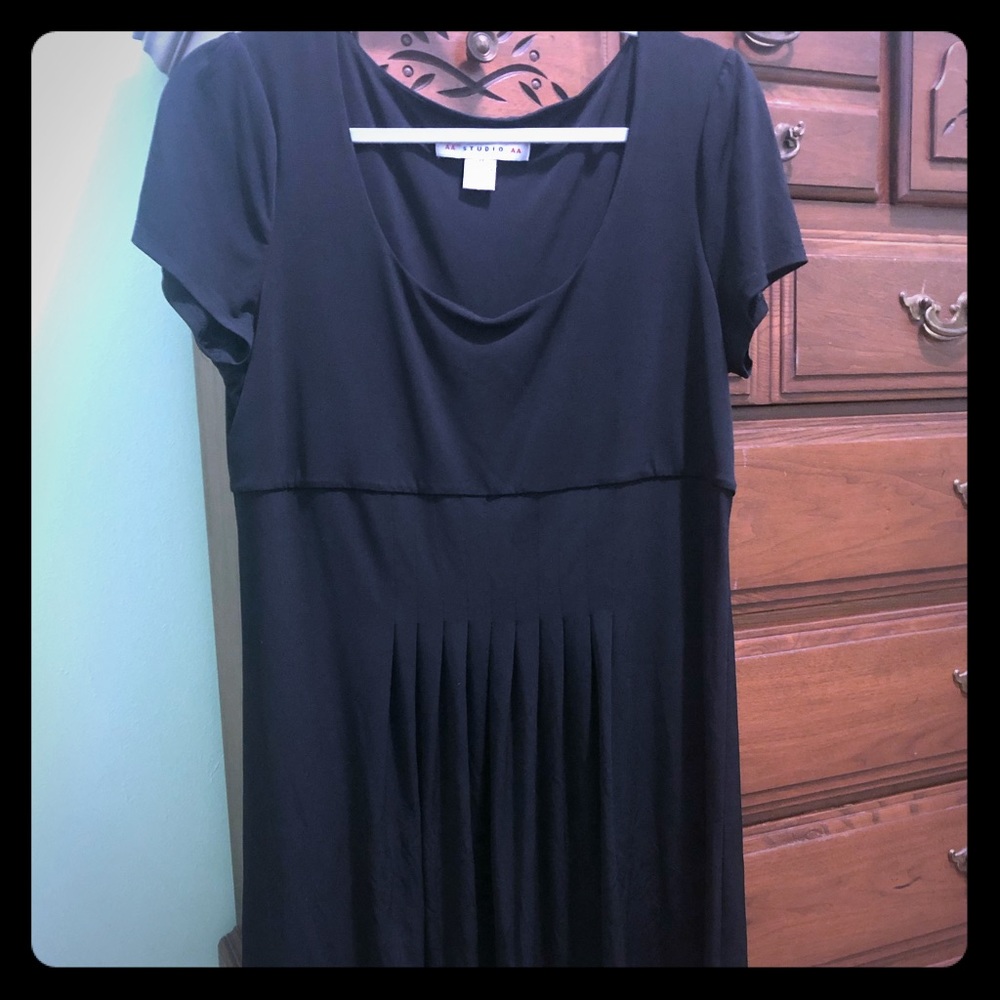 Black dress with pleats